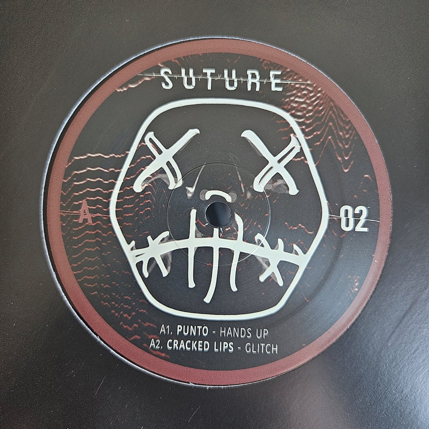 Suture Records 002
